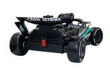 Mini auto per bambini Mercedes F1 - vista posteriore su sfondo bianco